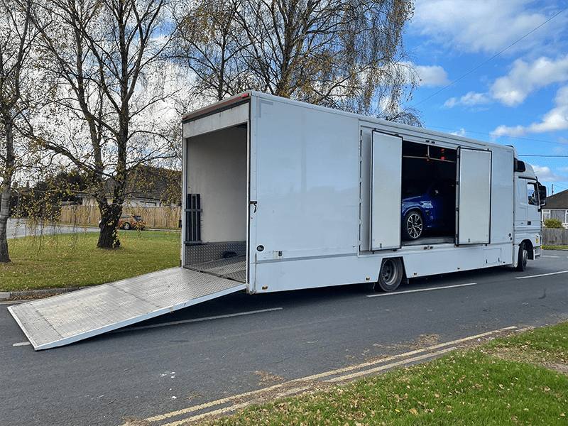 A single vehicle loaded in a dedicated enclosed trailer
